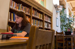 female student studying in zimerman library
